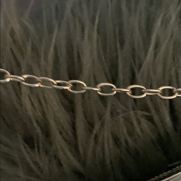 Sophisticated Silver Textured Clutch for Evening Wear - Picture 11 of 14